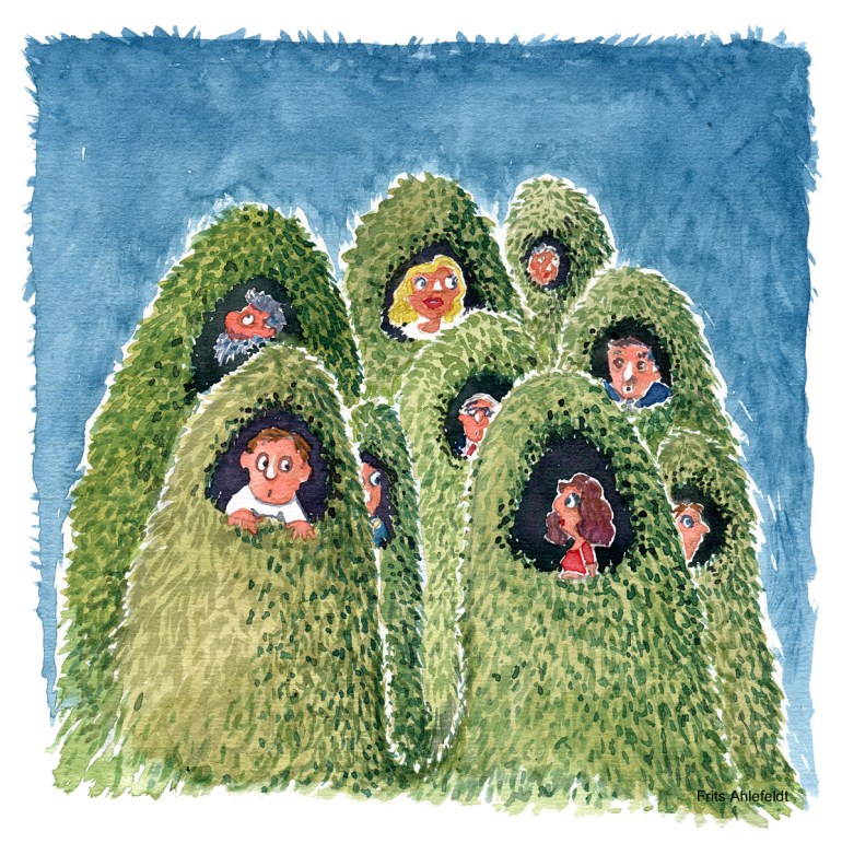grass cocoons with people in them
