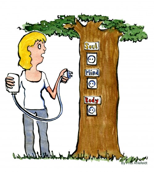 woman plugging her smartphone into a tree