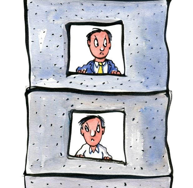 Men in small boxes on top of each other