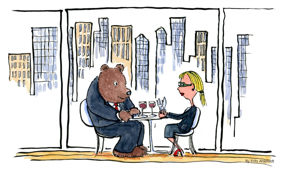 Bear and blond eating lunch at a city restaurant