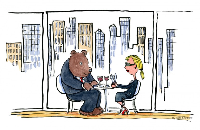 Bear and blond eating lunch at a city restaurant