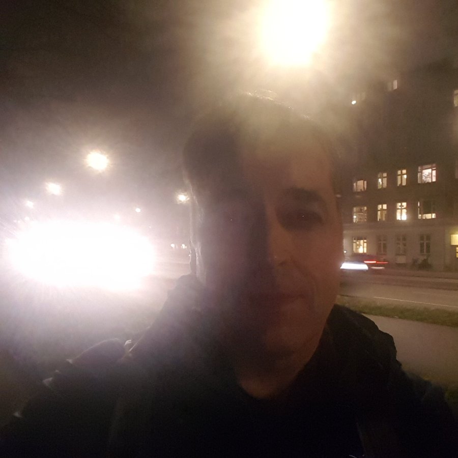 Frits Ahlefeldt, walking on road, photo