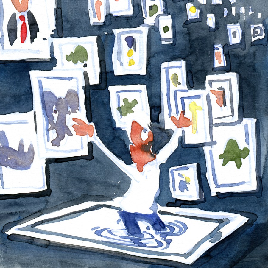 man standing among framed images