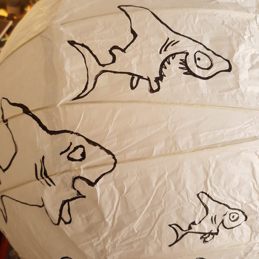 Shark personalities drawing by Frits Ahlefeldt. Artwork on rice paper lamp.