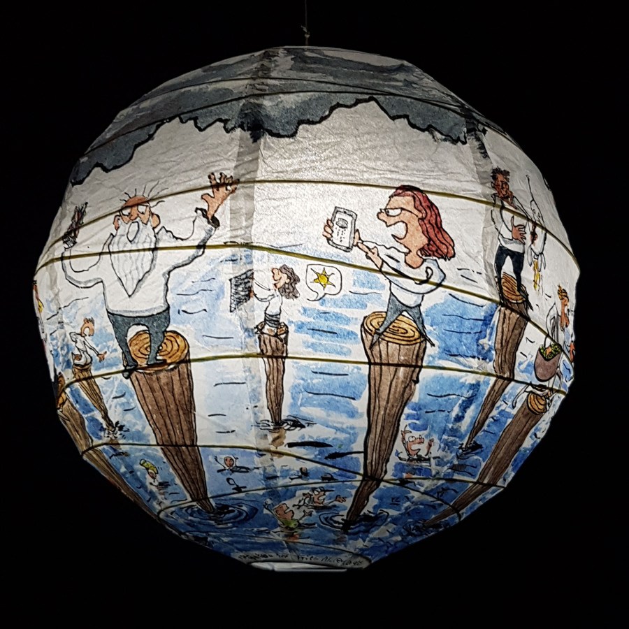 Drawing up people on wooden sticks talking about different things while the water gets higher. Sphere painting by Frits Ahlefeldt on Rice paper lamp