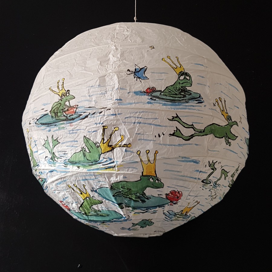 Painting of frog with crown waiting for a princess. Artwork by Frits Ahlefeldt. On rice paper lamp